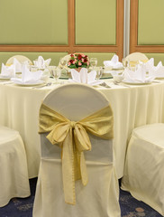 Wedding chairs with yellow ribbon