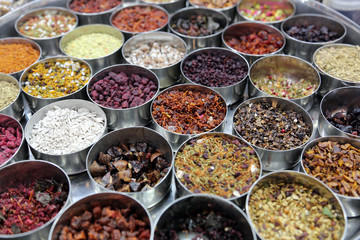 Spices and herbs in bowls on a street market in Kolkata