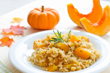 Pumpkin risotto with rosemary for healthy dinner