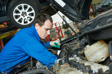 auto mechanic repairman at work