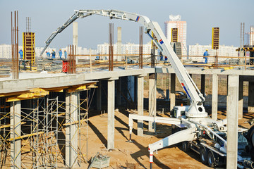 building works with concrete pump © Kadmy