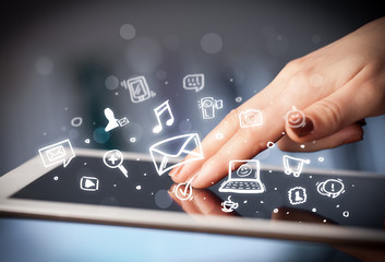 Finger pointing on tablet pc, social media concept