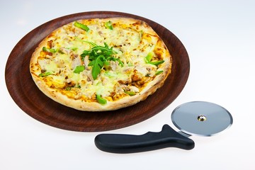 Chicken Pasta on Tray and Pizza Cutter on white