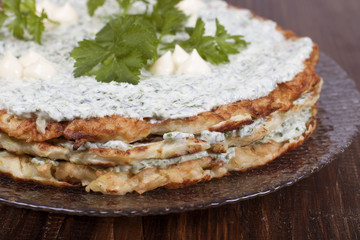Cake  of  pancakes zucchini  with curd cream with parsley, dill.