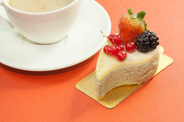 Green tea mouse cake with mixed berry fruits topping