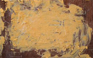 Wooden board covered with yellow paint