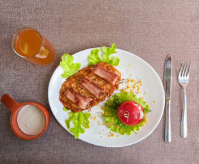 veal meat with bacon