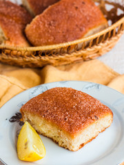 lemon cinnamon rolls on a wooden background