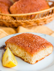lemon cinnamon rolls on a wooden background