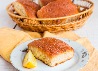 lemon cinnamon rolls on a wooden background