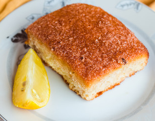 lemon cinnamon rolls on a wooden background