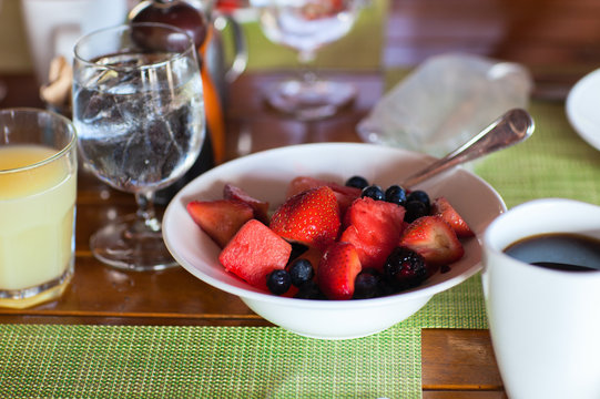 Breakfast with fresh fruits and coffee