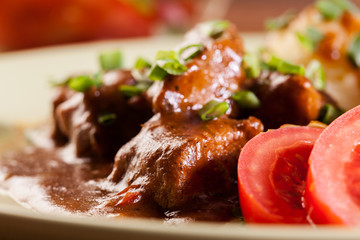 Goulash with boiled potatoes