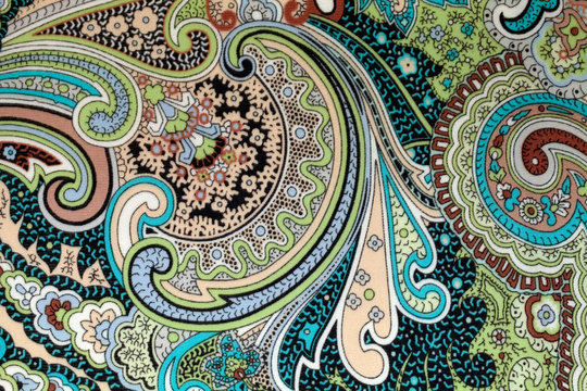 colorful vintage fabric with blue and brown paisley print