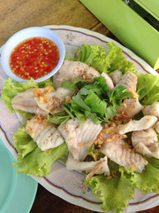 closed up boiled fish with spicy sauce