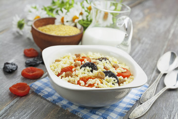 Millet porridge with dried apricots and prunes