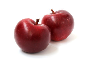 Two ripe red apples