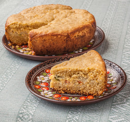 Portion of oat flour cake stuffed with vegetables