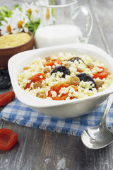 Millet porridge with dried apricots and prunes
