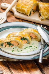 Salmon baked in puff pastry