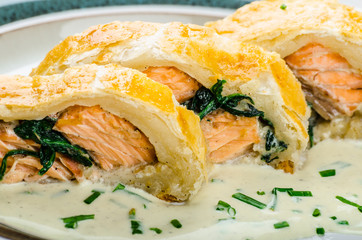 Salmon baked in puff pastry