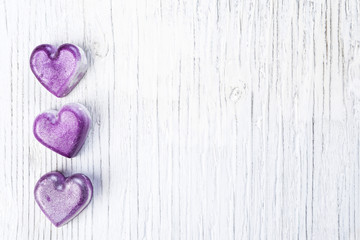  hearts wooden background,