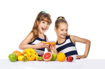 Fototapeta premium girl with citrus on a white background