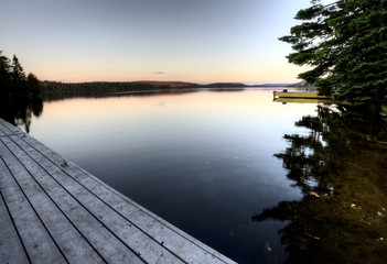 Fototapeta na wymiar Lake in Autumn sunrise reflection