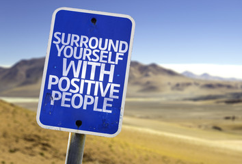 Surround Yourself with Positive People sign with a desert