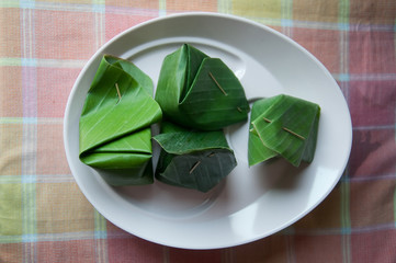 Thai dessert, Sticky rice with steamed custard, wrapped in banan