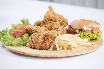 Fried chicken, burger and french fries