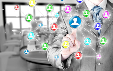 Businessman pressing modern social buttons