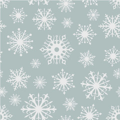Seamless snowflakes background.