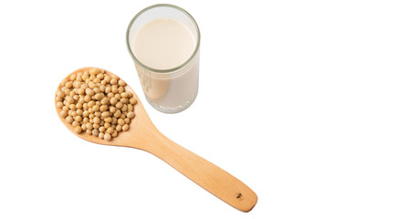 Soybean in a white bowl and a glass of soybean milk over white 