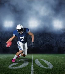 Foto op Plexiglas American Football Player running with the ball © Brocreative