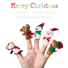 Christmas toys put on a hand on a white background