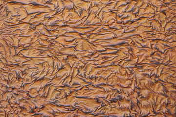 Decorative relief brown and black plaster