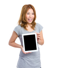 Woman with blank screen of tablet