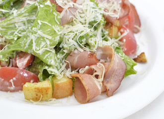 Close up of salad with bacon and vegetables
