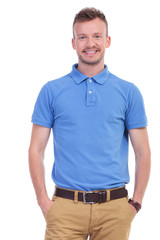 casual young man with hands in pockets