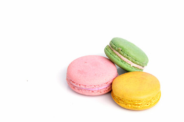 various types French macarons on white background