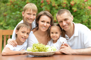 Family of five eating