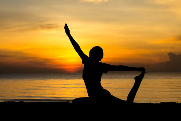 women playing yoga