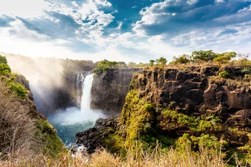 Cercles muraux Cascades The Victoria falls with dramatic sky
