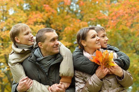 family of four relaxing