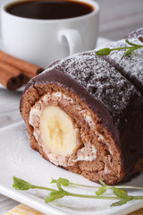 Delicious chocolate cake with banana closeup vertical
