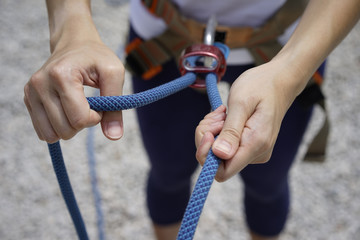 Close up of Woman's hand in belaying activities