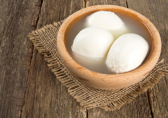 mozzarella cheese on wooden table