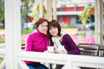 Mother and daughter in cafe