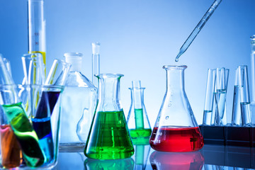Laboratory equipment, lots of glass filled with colorful liquids